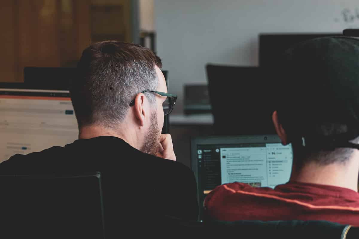 Do professors know if you use Chegg? Two students looking at computers